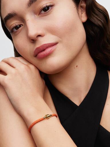 Shimmering Orange Cord Bracelet
